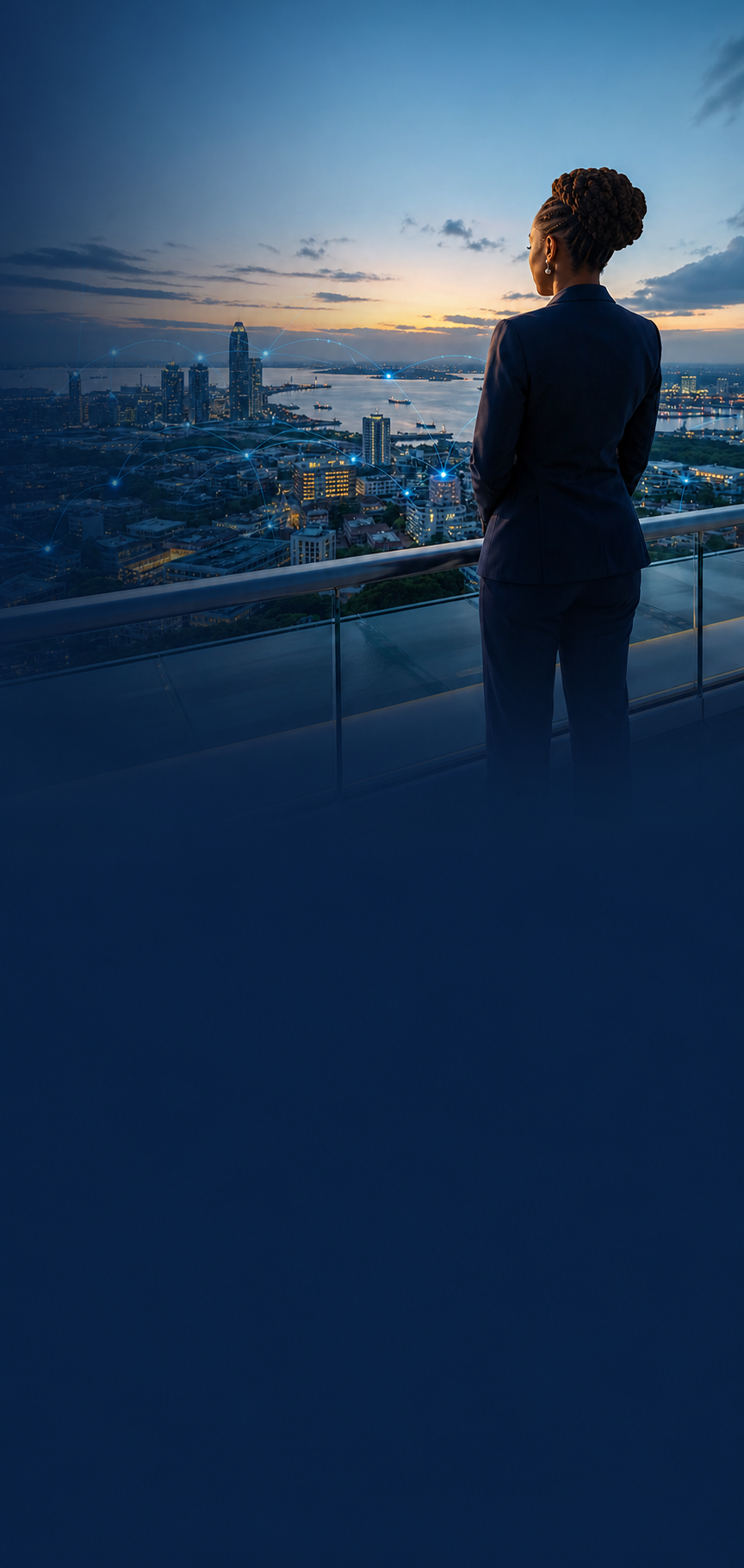 Tanzanian executive overlooking Dar es Salaam at blue hour